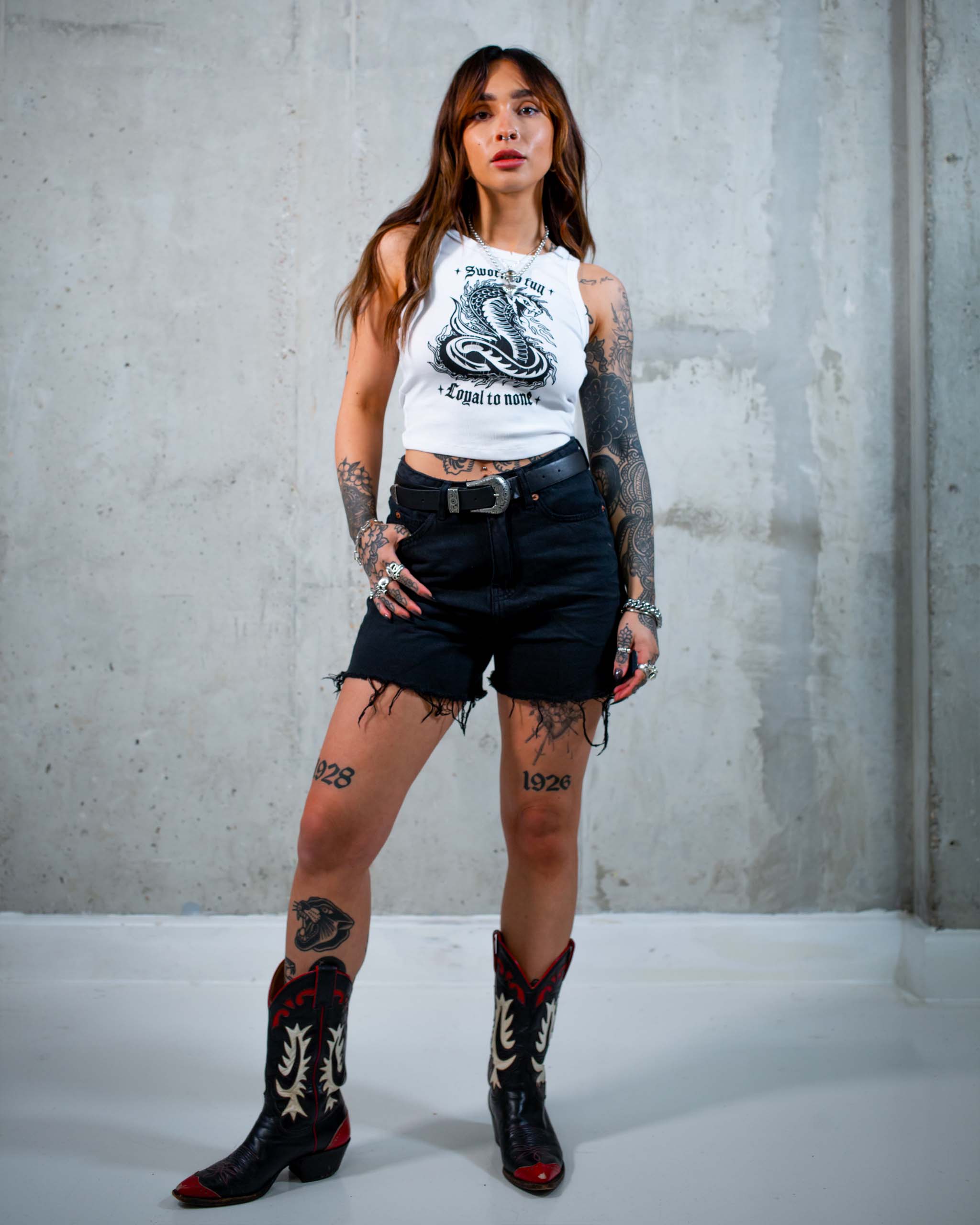 The Sworn to Fun cobra tank top by Sleazy Rider, featuring a tattoo style cobra graphic.