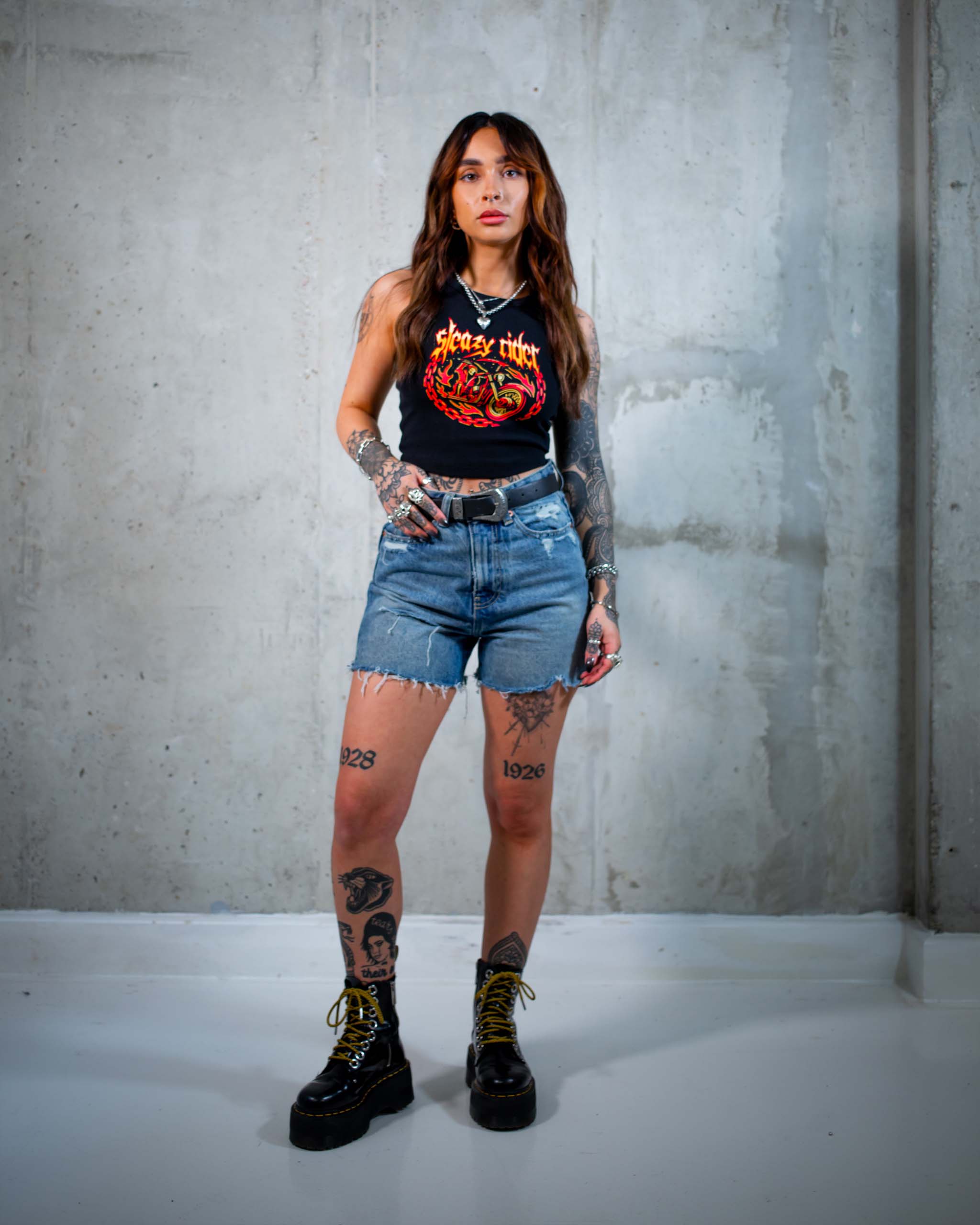 The Flaming Reaper tank top by Sleazy Rider, featuring the grim reaper on a Harley Davidson motorbike.