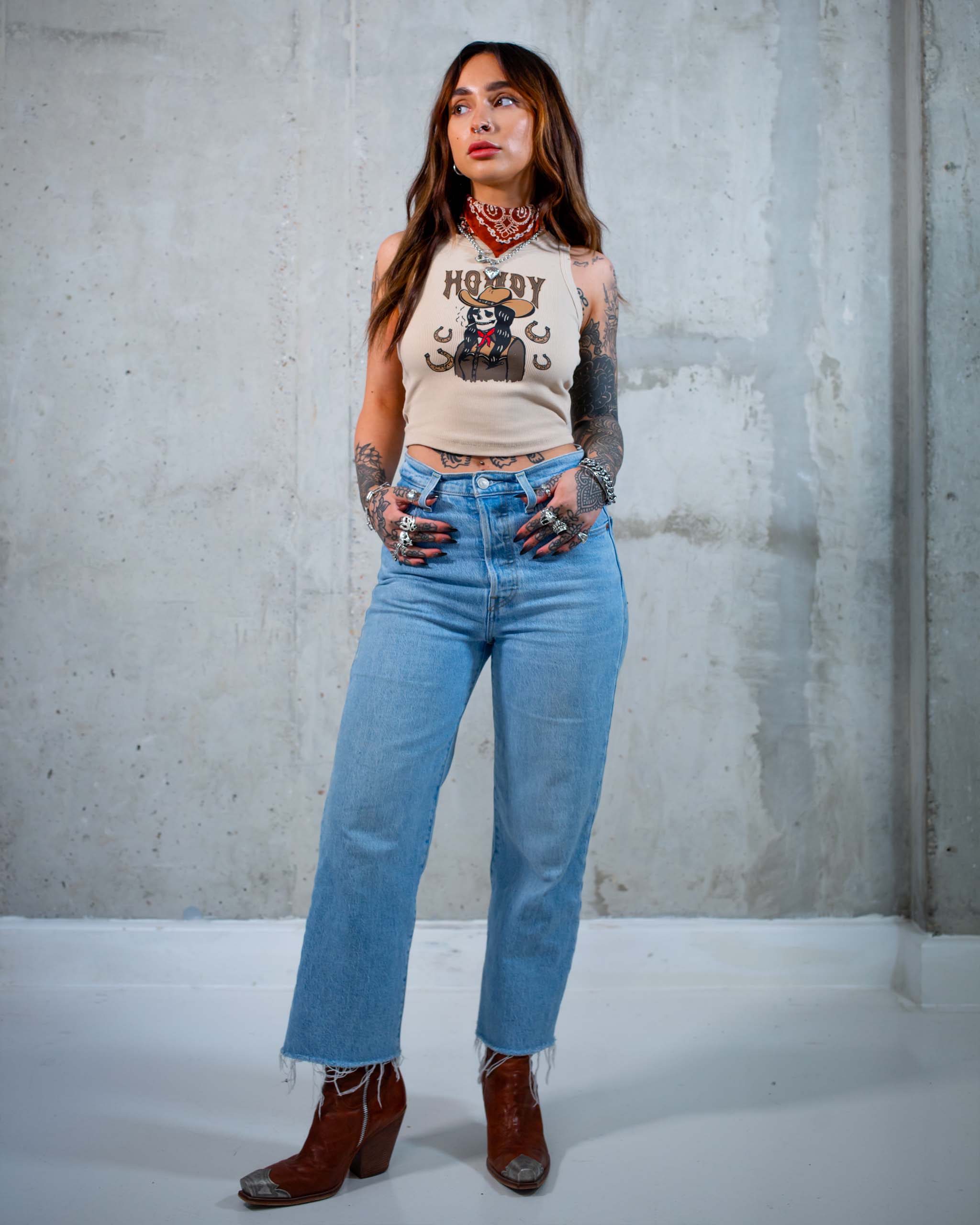 The Howdy tank top by Sleazy Rider, featuring a wild west cowgirl skull.