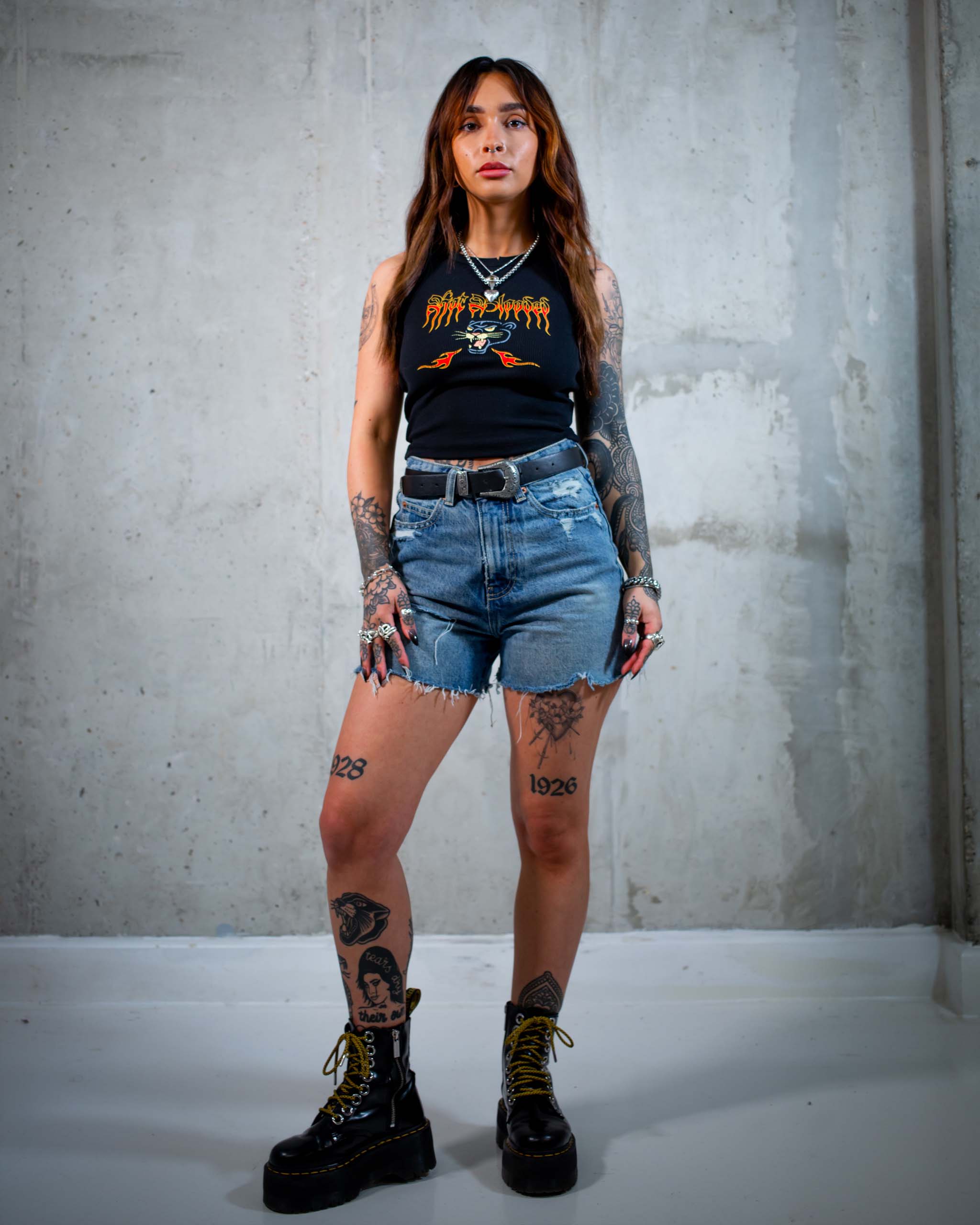The Hot Blooded tank top by Sleazy Rider, featuring a tattoo style panther head.