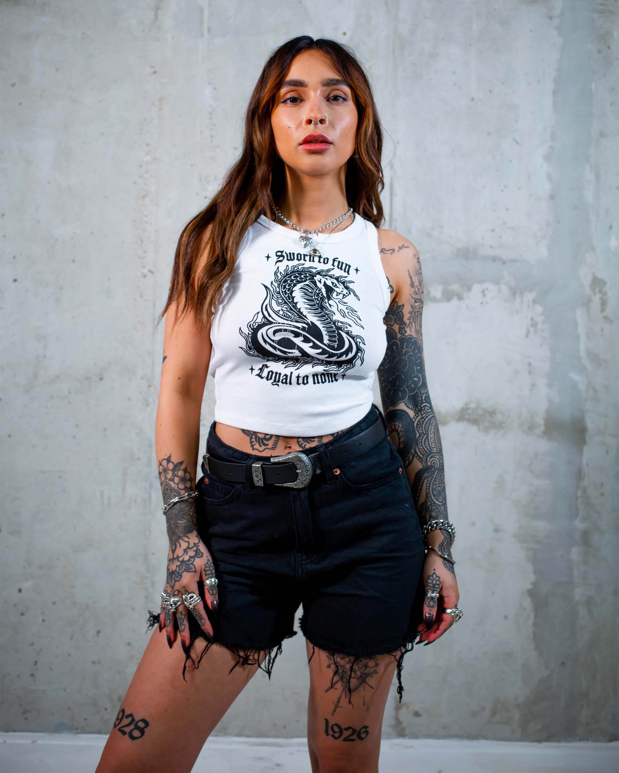 The Sworn to Fun cobra tank top by Sleazy Rider, featuring a tattoo style cobra graphic.