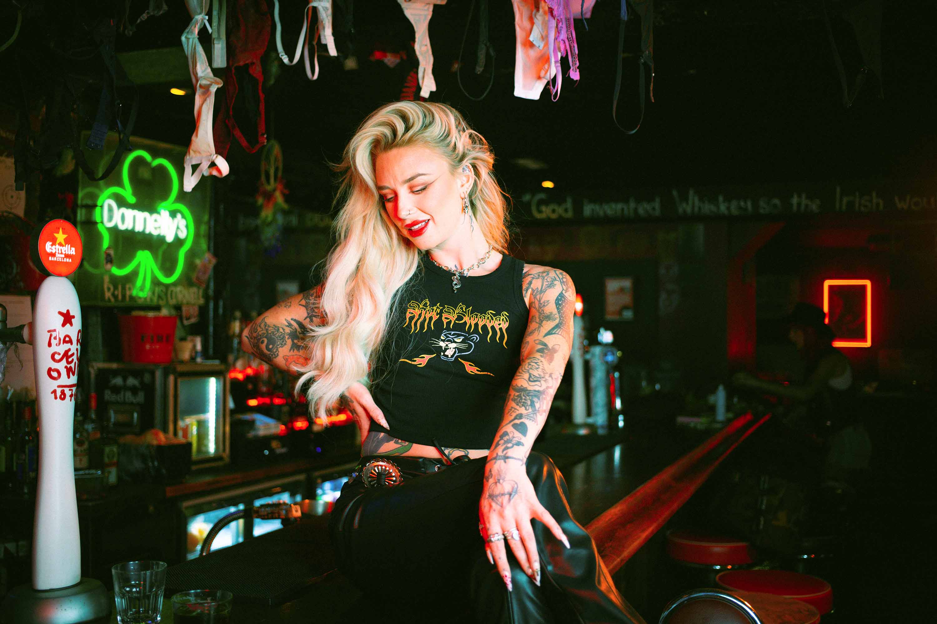 Rhiannon Brailsford wearing a Sleazy Rider tank top