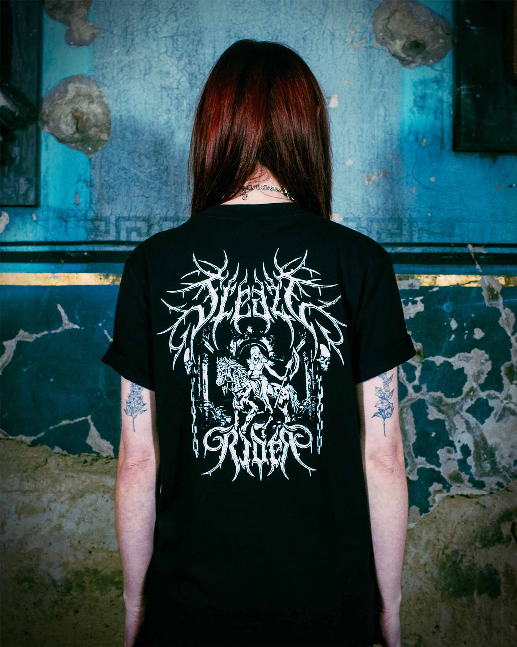 The back print of an alternative gothic t-shirt by Sleazy Rider
