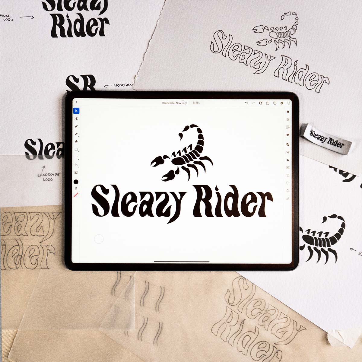Sleazy Rider logo on an iPad