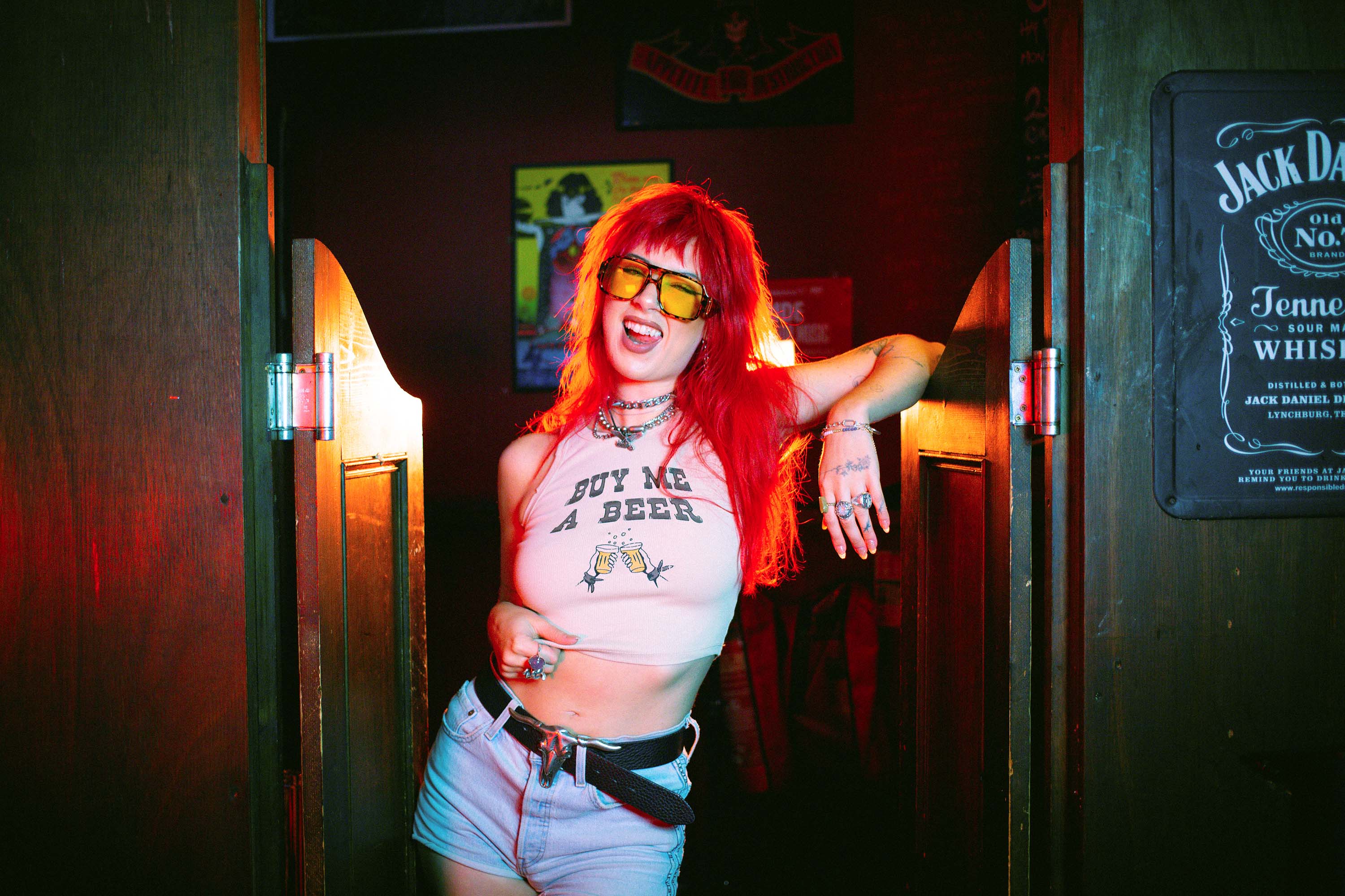 Amy Valentine wearing a Buy Me A Beer tank top