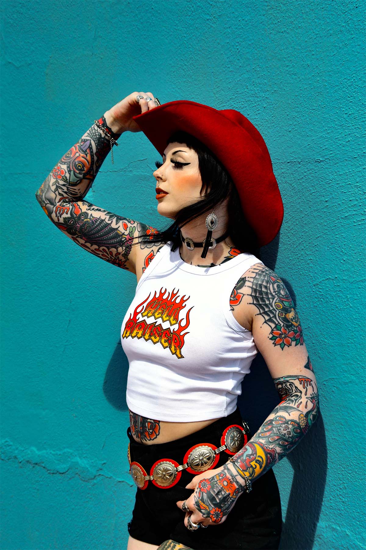 An alternative model wearing a Sleazy Rider Hell Raiser tank top