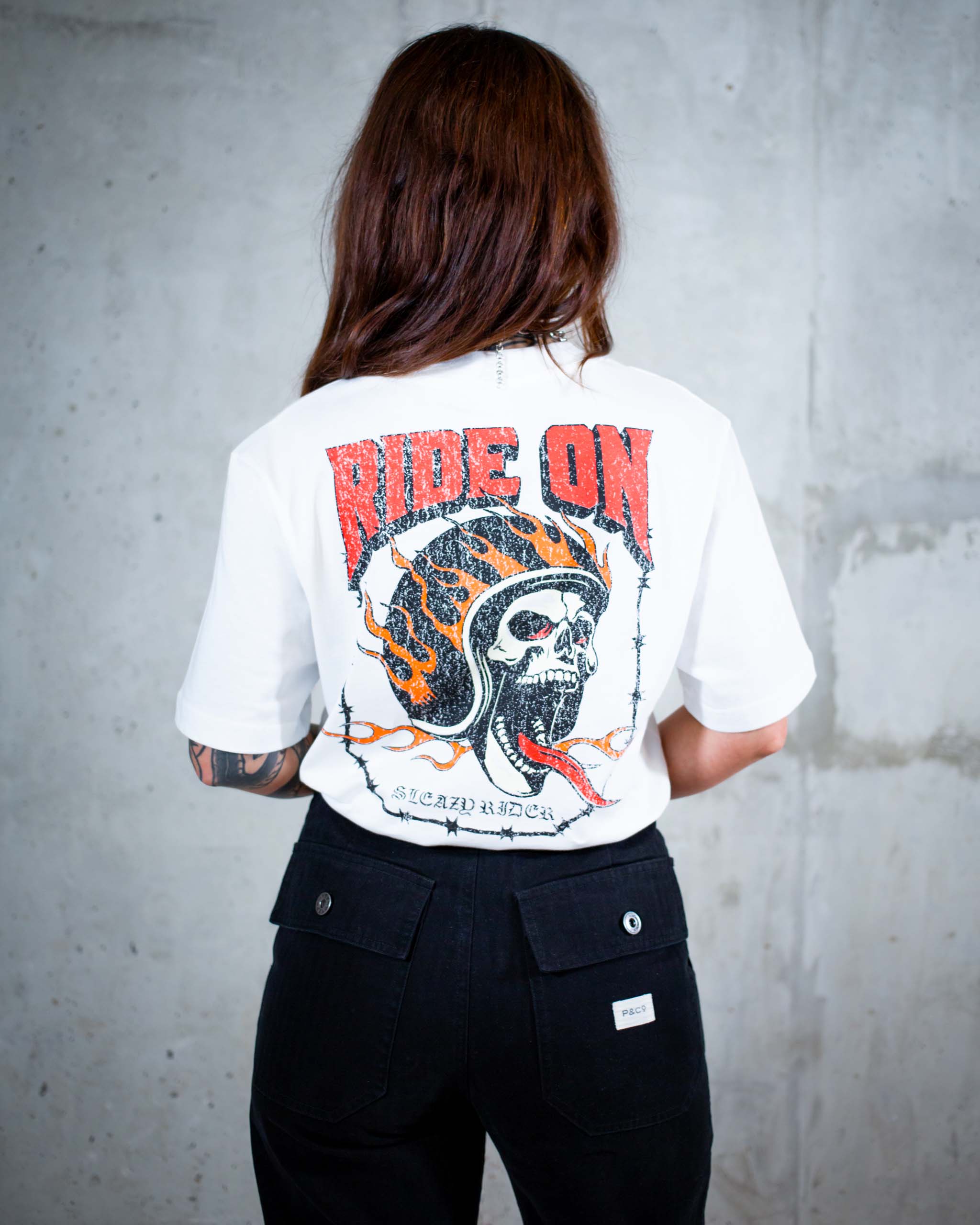 The Ride On biker t-shirt by Sleazy Rider. Featuring a distressed flaming skull print.