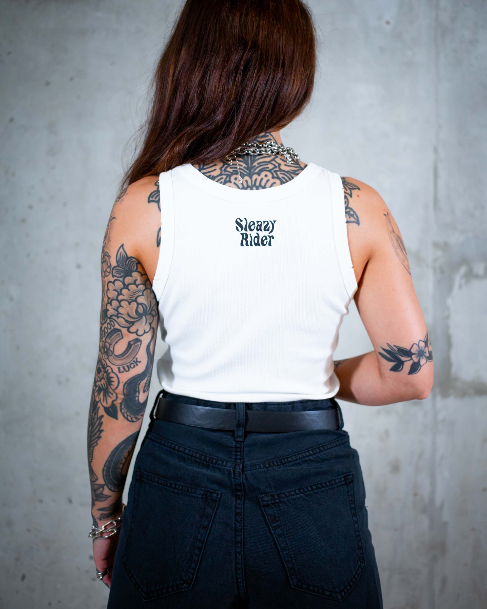 The Ride On biker tank top by Sleazy Rider. Featuring a distressed flaming skull print.