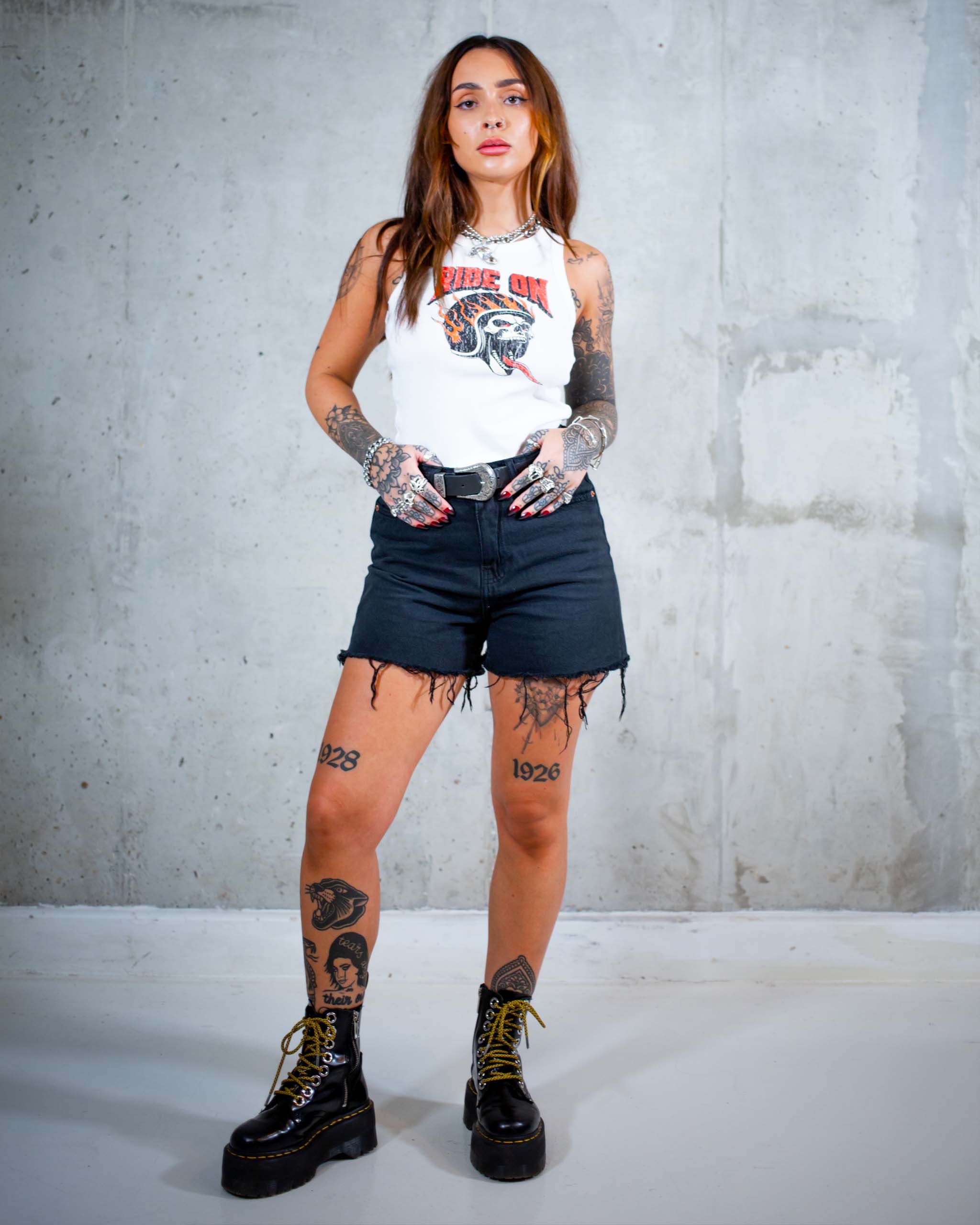 The Ride On biker tank top by Sleazy Rider. Featuring a distressed flaming skull print.