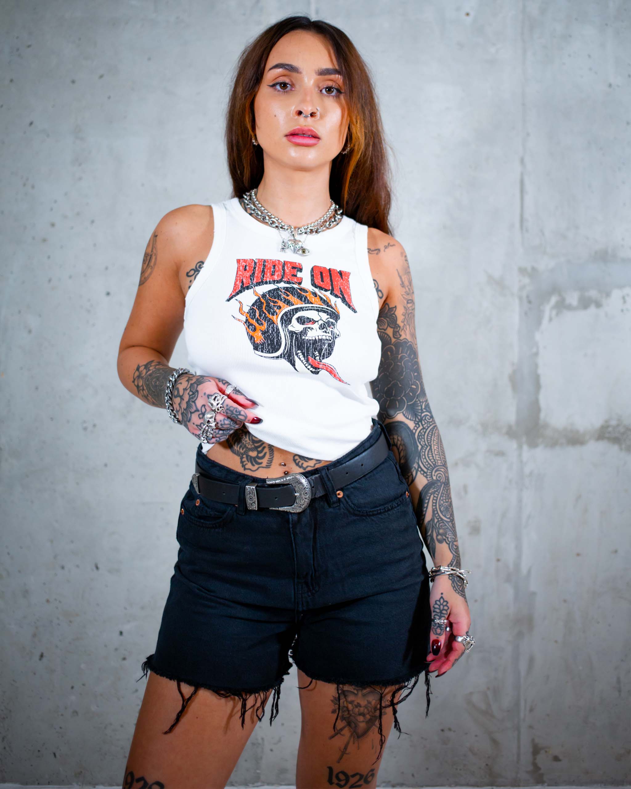 The Ride On biker tank top by Sleazy Rider. Featuring a distressed flaming skull print.