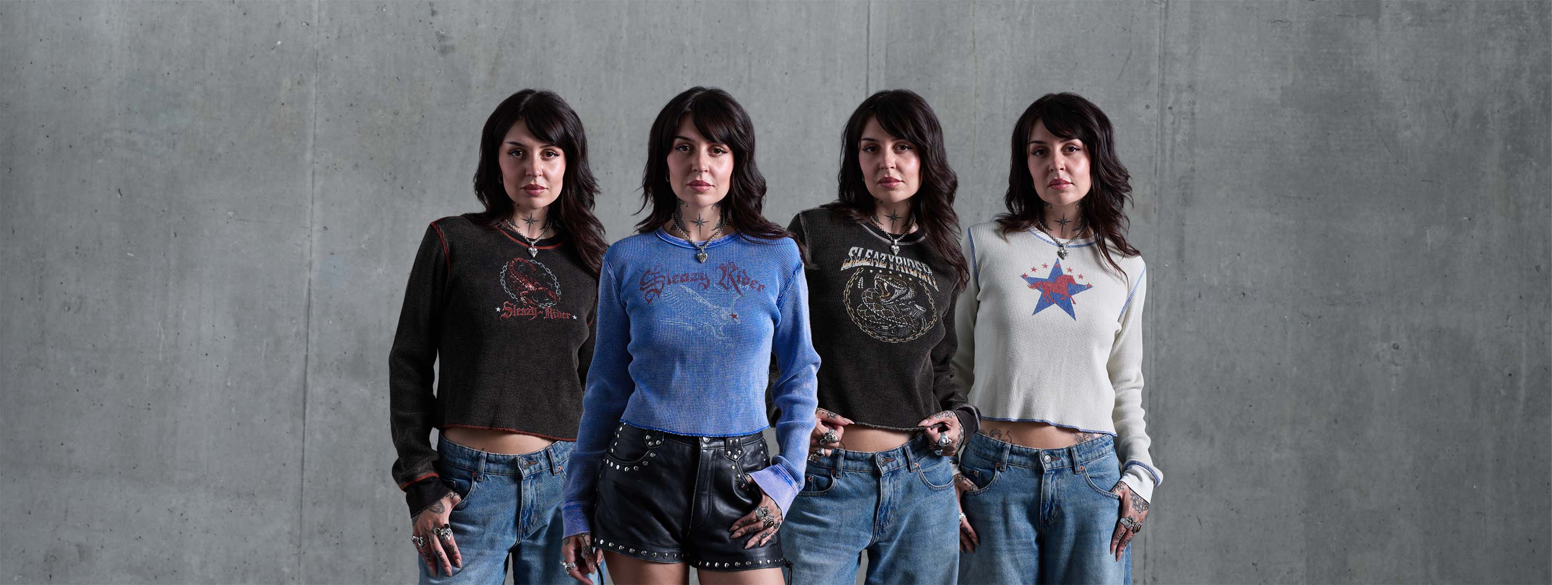 Four alt women wearing sleazy rider waffle knit long sleeve tops. Concrete background.