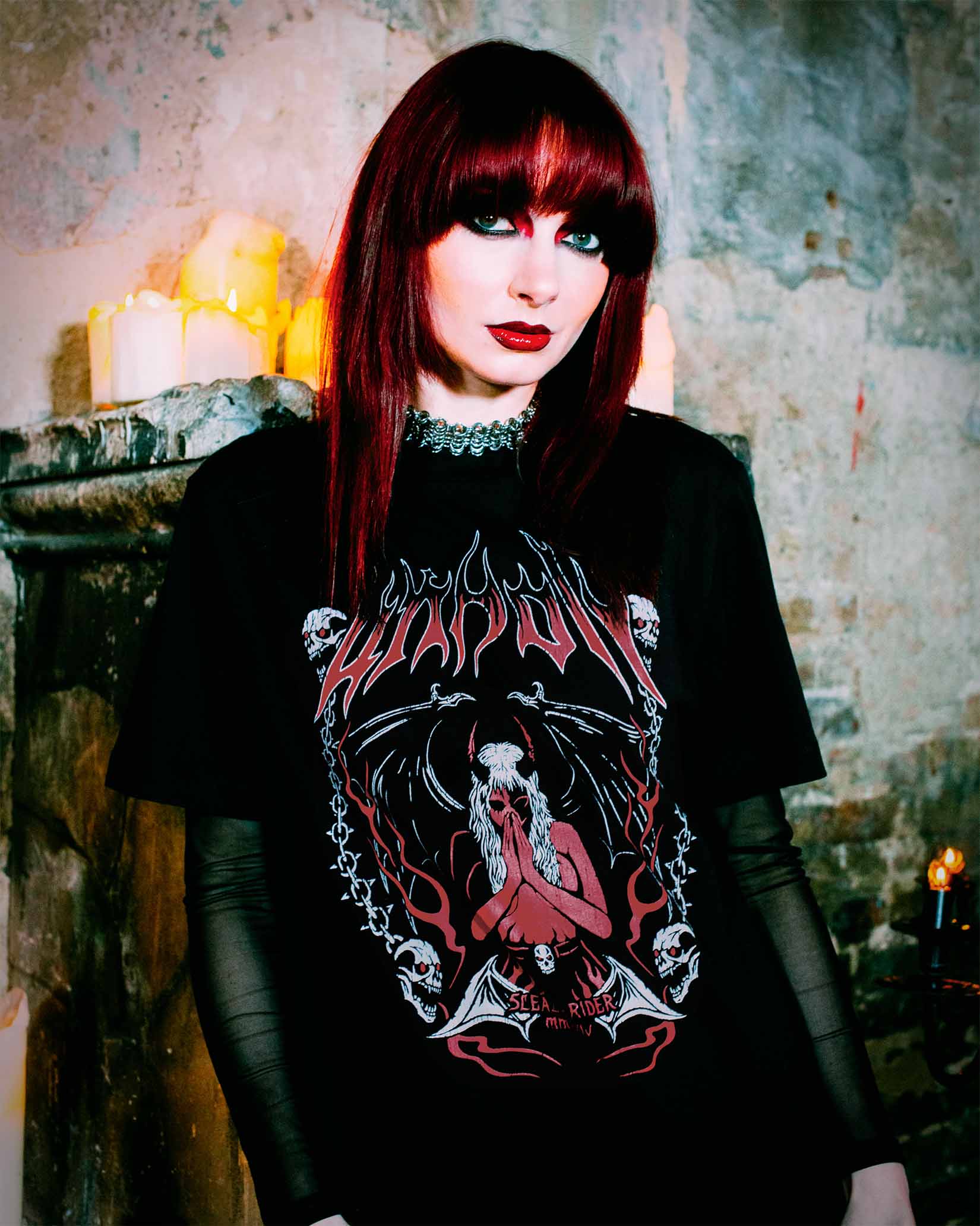 An alternative model wearing a Sleazy Rider Unholy t-shirt