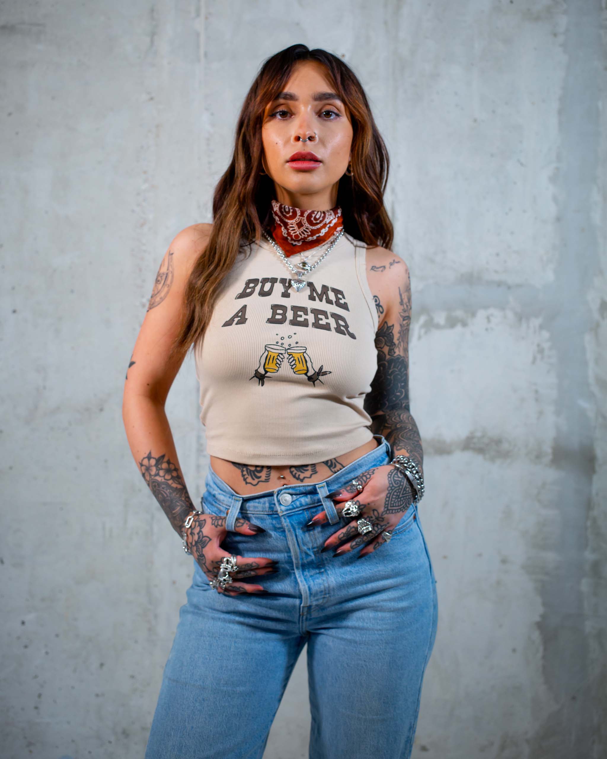 Sleazy Rider tank top featuring 'Buy Me A Beer' slogan print.