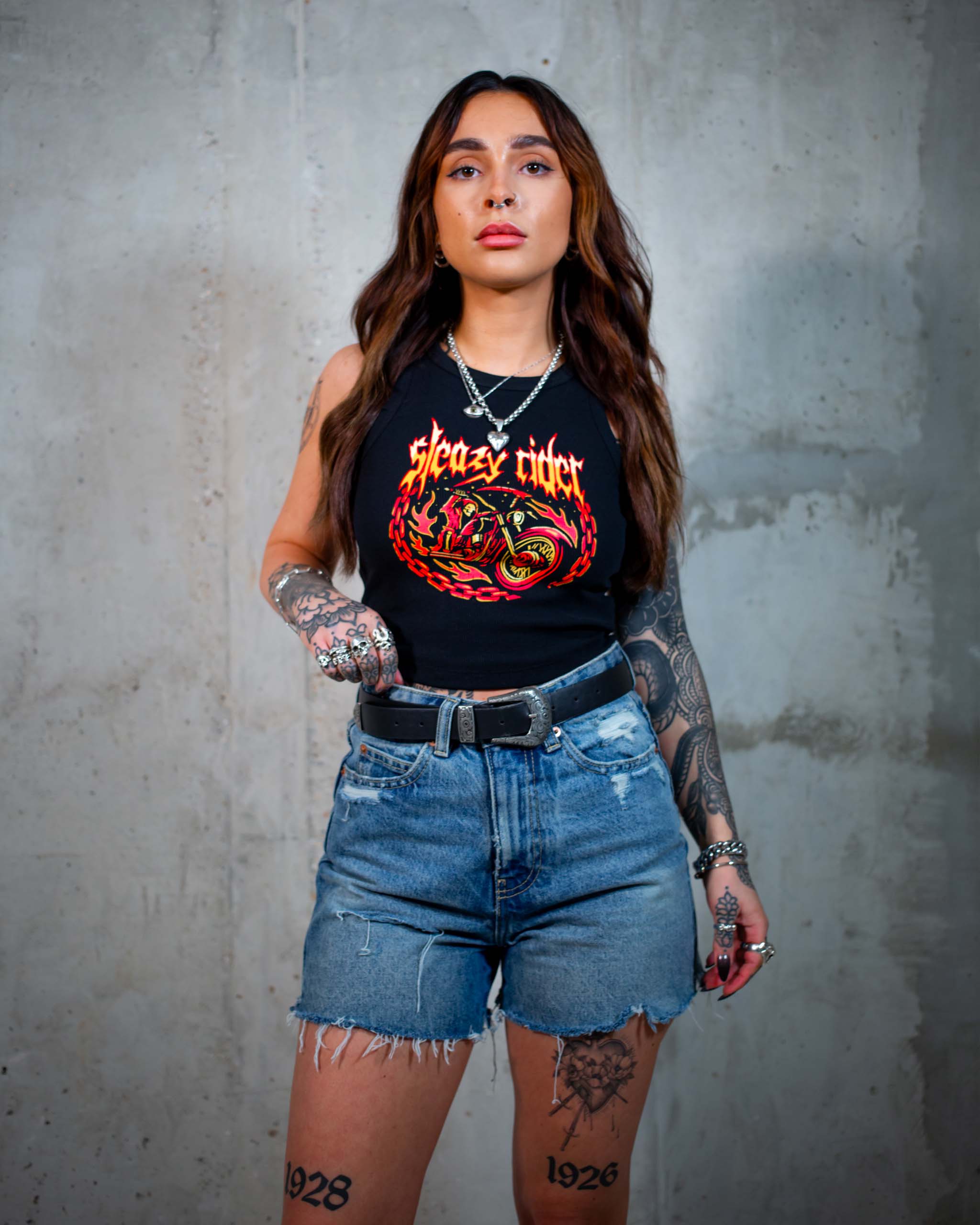 The Flaming Reaper tank top by Sleazy Rider, featuring the grim reaper on a Harley Davidson motorbike.