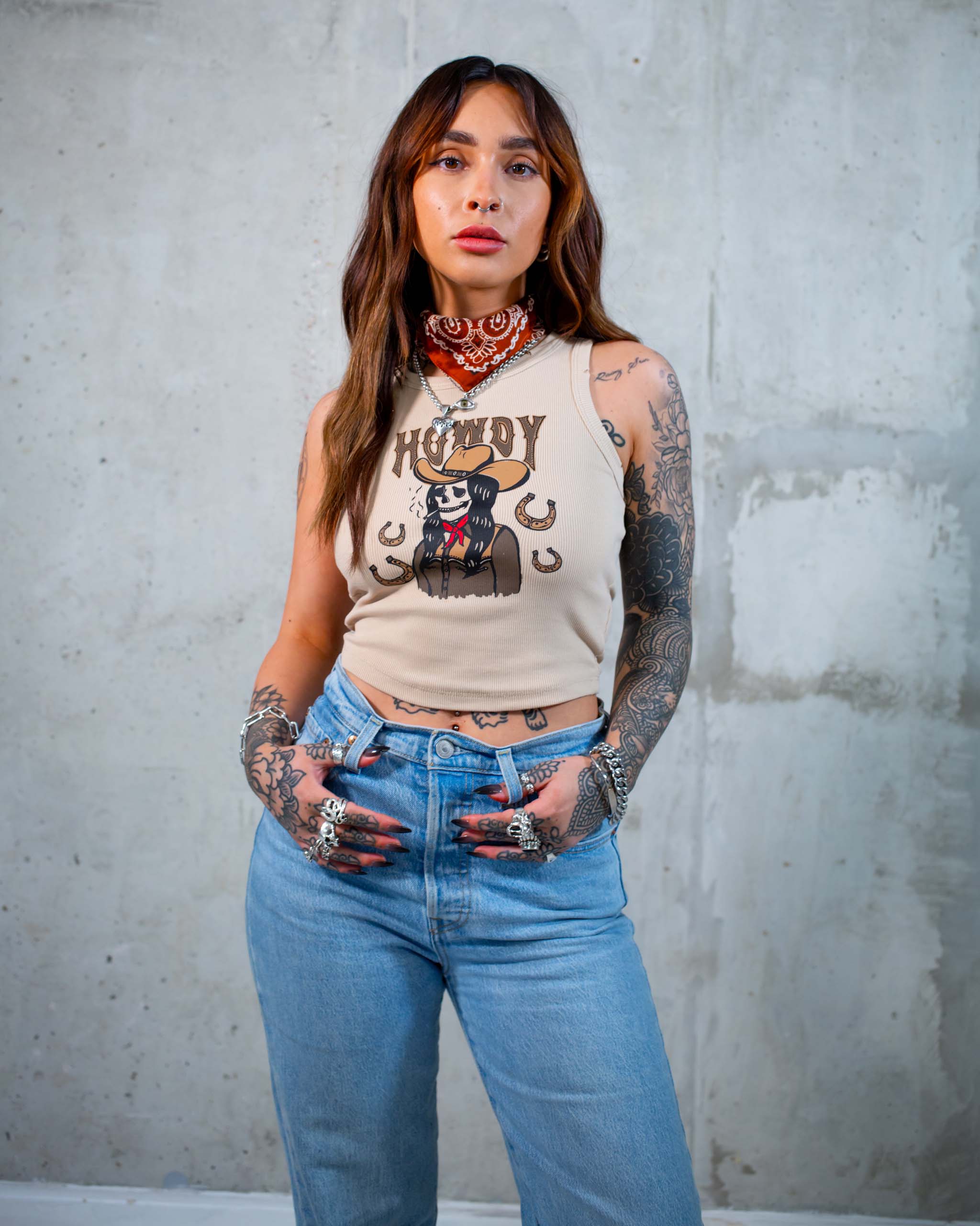 The Howdy tank top by Sleazy Rider, featuring a wild west cowgirl skull.