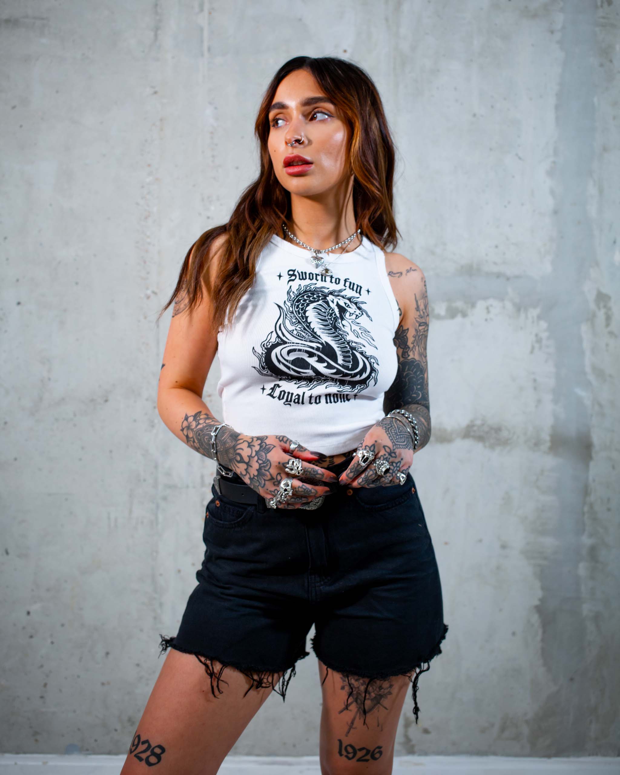 The Sworn to Fun cobra tank top by Sleazy Rider, featuring a tattoo style cobra graphic.