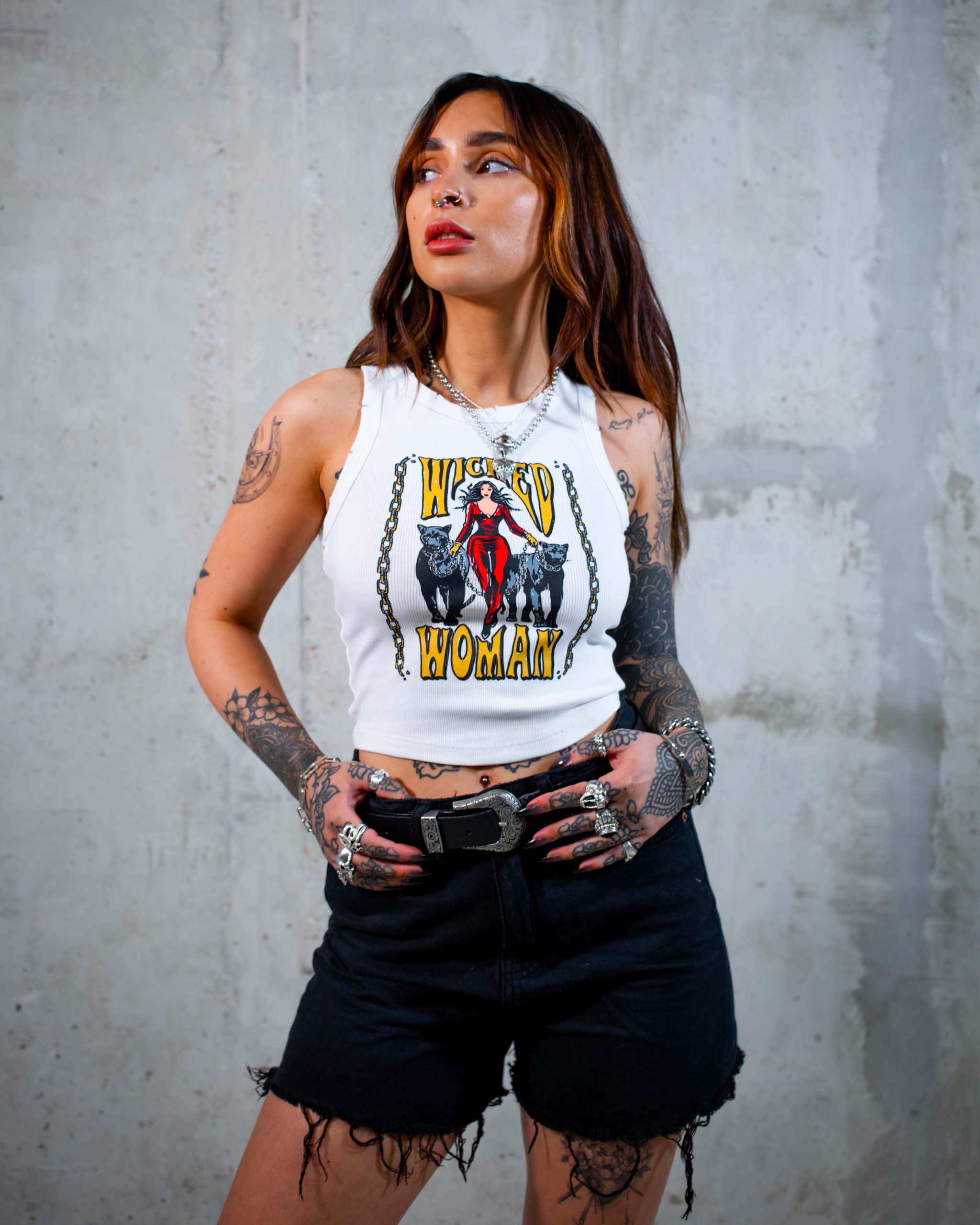 The Wicked Woman tank top by Sleazy Rider, featuring a woman in a catsuit with two panthers on a leash.