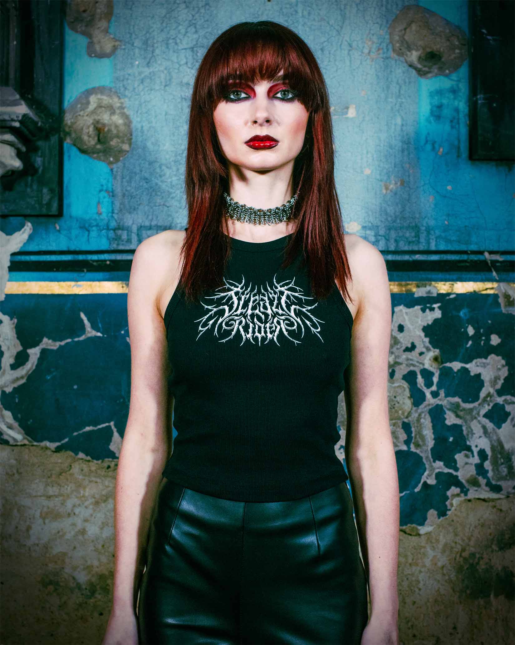 Alternative model wearing a gothic tank top