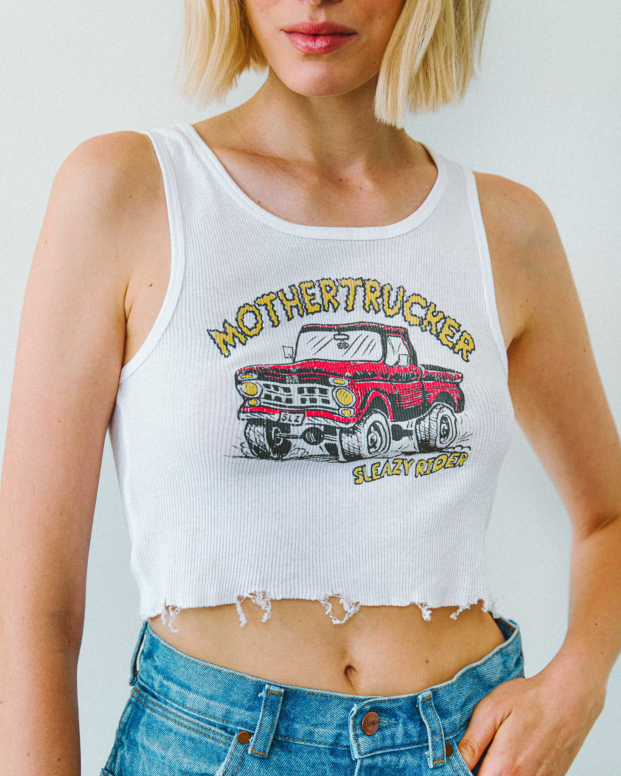 A white tank top with a "Mothertrucker" vintage truck print.