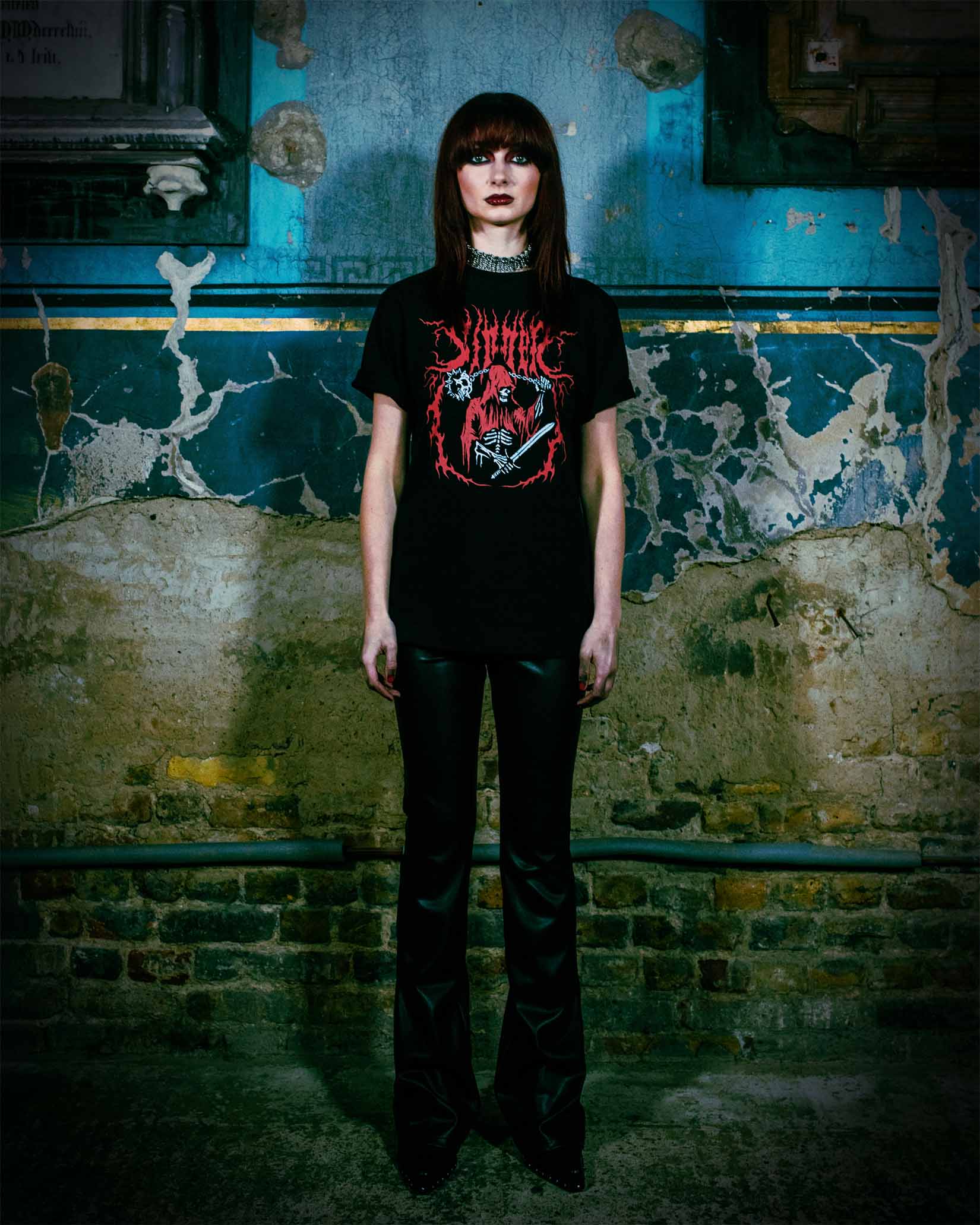 An alt girl wearing a heavy metal t-shirt